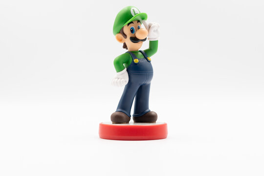 Nakhon Si Thammarat, Thailand - December 26, 2024 - Nintendo amiibo Super Mario series figure Luigi on white background