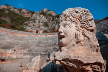 Obraz premium Ruins of the ancient city of Myra in Demre, Turkey. Ancient tombs and amphitheater.