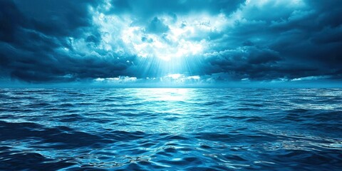 The ocean is blue and the sky is cloudy