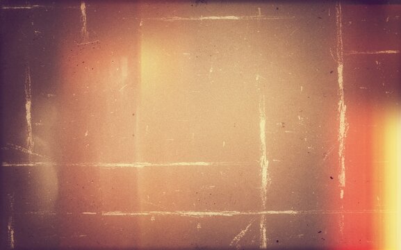 Vintage distressed old photo light leaks, film grain, dust and scratches texture overlay with vignette border. Dirty grunge analog 8k widescreen retro effect background with copy space