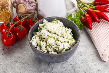 Curd cheese with green herbs