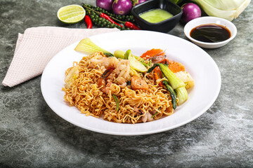 Asian cuisine - Fried noodles with seafood