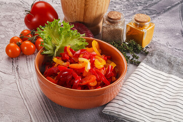 Diced raw bell red and yellow pepper