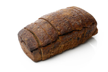Rustic whole grain bread showcasing rich texture and deep color on a clean white surface