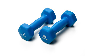 Bright blue dumbbells on a clean surface ready for a workout to enhance fitness and build strength