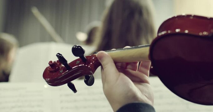 Close-Up of a Violin During Orchestra Practice