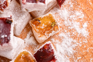 Sweet food Turkish delight, assorted rahat locum in form of cubes with nuts and powdered sugar, traditional food