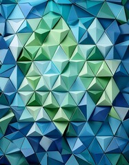 Abstract 3D geometric pattern in shades of blue and green.
