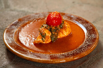 Mole de segueza with chicken is a traditional recipe from Oaxaca made with yellow cracked corn, pitiona and guajillo chili, among other ingredients.
