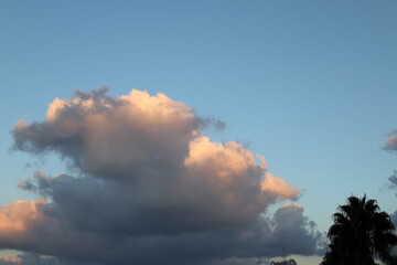 white clouds are floating across the sky