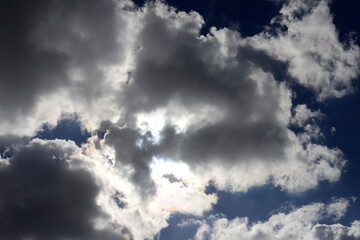 white clouds are floating across the sky