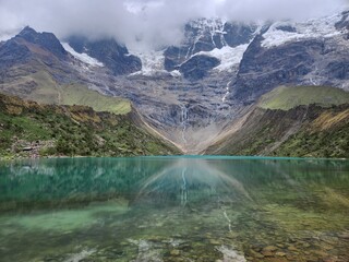 Peru, Cusco region, Humantay Lake. The bottom of the lake can be seen through the clear water.