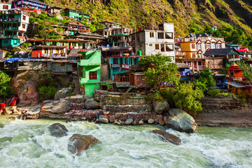 Colorful local houses in Manikaran, India © saiko3p