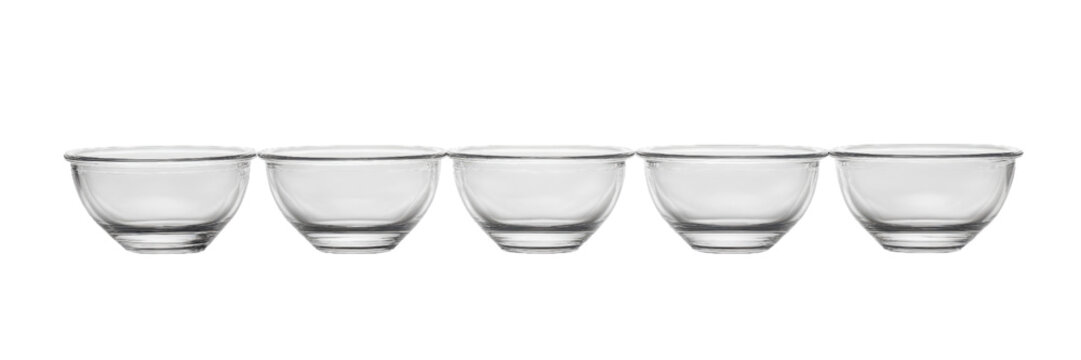 Minimalist glass measuring cups on a clean white background, ideal for precise cooking and baking measurements, elegant and functional design