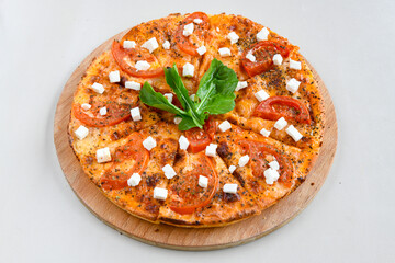 Traditional Turkish cuisine. Pizza, pita, pidesi, sucuk, hummus, kebab. Many dishes on the table. Serving dishes in restaurant. Margherita,  mix, formaggi, veggie karisik pizza. Top view, flat lay