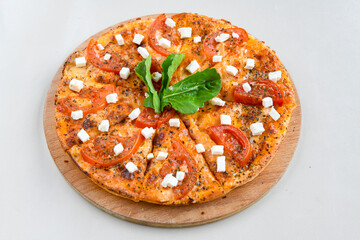 Traditional Turkish cuisine. Pizza, pita, pidesi, sucuk, hummus, kebab. Many dishes on the table. Serving dishes in restaurant. Margherita,  mix, formaggi, veggie karisik pizza. Top view, flat lay