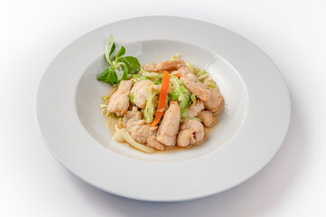 Generated imageSteamed chicken with vegetables , traditional Chinese dish isolated on white background