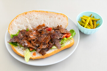 Meat Chicken Doner, between bread (Turkish Name : ekmek arasi et doner, tavuk doner, Gobit ekmek arasi, Turk kebabi)