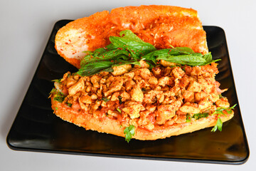 Meat, chicken shawarma kebab with yogurt and fried butter sauce .Tantuni Special. Yogurtlu Mersin usulu et , tavuk tantuni durum. Ekmek arasi tantuni.  