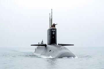 Fototapeta premium A person stands on top of a submarine underwater, offering a unique perspective