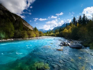 Gordijnen A vibrant turquoise river flows through a serene mountain valley. Lush green and autumnal foliage line the banks, under a brilliant blue sky scattered with fluffy white clouds. The water is clear and  © YiuCheung