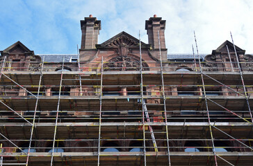 Old 19th Century Stone Commercial Building with Scaffolding 