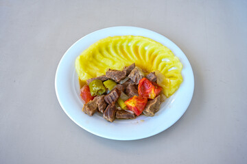 Famous Urfa meat liver, ciger wrapped by lavash with roasted chili pepper, onion and sauce in Sanliurfa, Turkey. Kuzu et ciger sis. Izgara dana bonfile, cop sis, kuzu pirzola. Karisik kebap, beyti keb