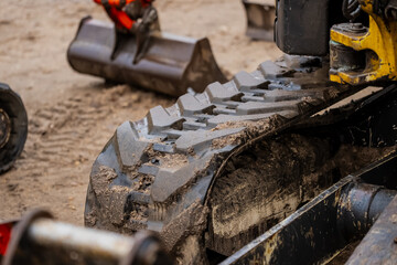 Industrial machinery tracks close up for construction equipment