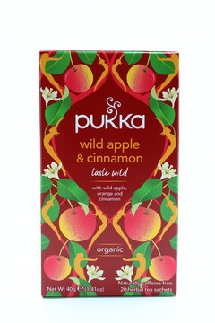 Pukka tea box. Taste of wild apple and cinnamon. White background.