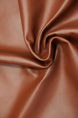 Leather texture: Elegant folds and shading A representation of high quality leather with visible...