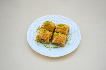 Turkish Dessert Sobiyet, havuc dilimi, midye baklava, mussels baklava and classic baklava with Pistachio . Cikolatali cevizli, fistikli soguk Baklava, top view.