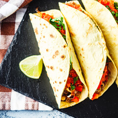 Delicious Spicy Mexican Tacos with Beef, Salsa, and Vegetables, Homemade Street Food, Healthy and Juicy Meal
