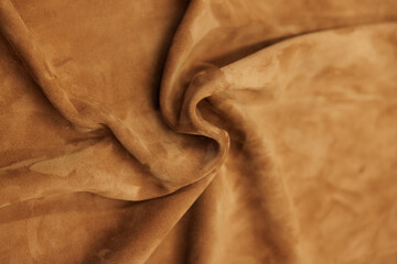 Leather texture: Elegant folds and shading A representation of high quality leather with visible...