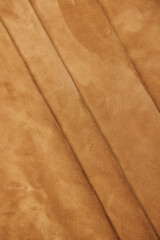 Leather texture: Elegant folds and shading A representation of high quality leather with visible wrinkles and shading that highlight the softness and structure of the material.