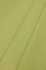 Leather texture: Elegant folds and shading A representation of high quality leather with visible wrinkles and shading that highlight the softness and structure of the material.