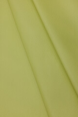 Leather texture: Elegant folds and shading A representation of high quality leather with visible wrinkles and shading that highlight the softness and structure of the material.