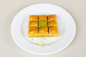Turkish Dessert Sobiyet, havuc dilimi, midye baklava, mussels baklava and classic baklava with Pistachio . Cikolatali cevizli, fistikli soguk Baklava, top view.