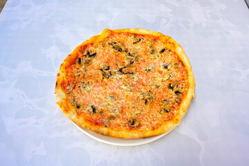 Traditional Turkish cuisine. Pizza, pita, pidesi, sucuk, hummus, kebab. Many dishes on the table. Serving dishes in restaurant. Margherita,  mix, formaggi, veggie karisik pizza. Top view, flat lay