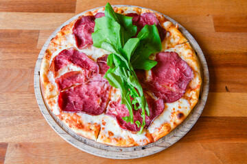 Traditional Turkish cuisine. Pizza, pita, pidesi, sucuk, hummus, kebab. Many dishes on the table. Serving dishes in restaurant. Margherita,  mix, formaggi, veggie karisik pizza. Top view, flat lay