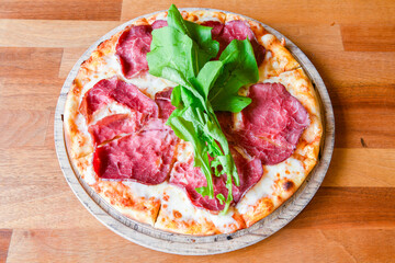 Traditional Turkish cuisine. Pizza, pita, pidesi, sucuk, hummus, kebab. Many dishes on the table. Serving dishes in restaurant. Margherita,  mix, formaggi, veggie karisik pizza. Top view, flat lay