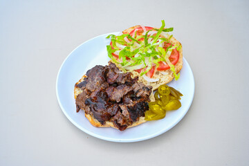 Meat Chicken Doner, between bread (Turkish Name : ekmek arasi et doner, tavuk doner, Gobit ekmek arasi, Turk kebabi)