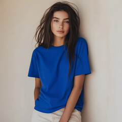 Fototapeta premium Woman Blue TShirt Casual Portrait Beige Background