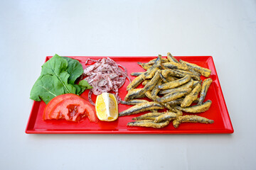 Fried Anchovies (Turkish Name: Hamsi Tava) .Hamsi, istavrit, sardalya tava. Balik kizartma. Izgara cipura levrek, palamut  yesil salata.