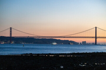 Lisbon bridge at night over the Tagus River 06 21 2024