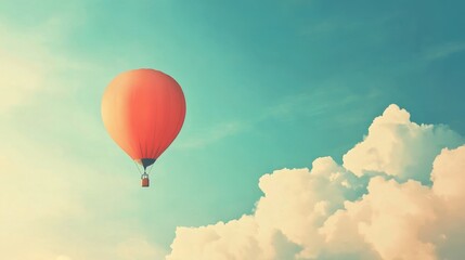 Fototapeta premium Colorful Balloon Floating in a Blue Sky