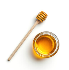 Honey jar and dipper on a white background showcasing a natural sweetener for healthy eating