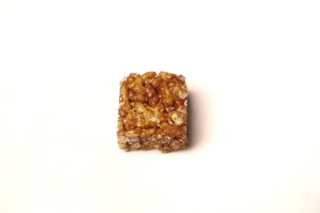 Jipang or berondong is indonesian traditional snack. Made from rice, corn coated with sweet caramel. Isolated white background