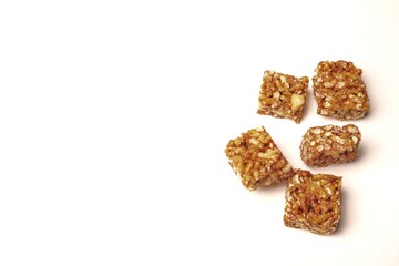 Jipang or berondong is indonesian traditional snack. Made from rice, corn coated with sweet caramel. Isolated white background