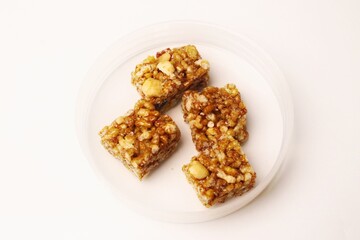 Jipang or berondong is indonesian traditional snack. Made from rice, corn coated with sweet caramel. Isolated white background