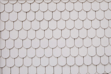 White tile roof texture background. Close up of white tile roof.